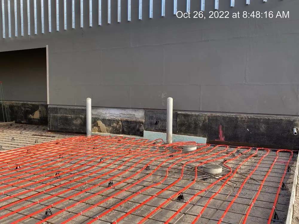 Snow melt heating cable laid out before a concrete pour