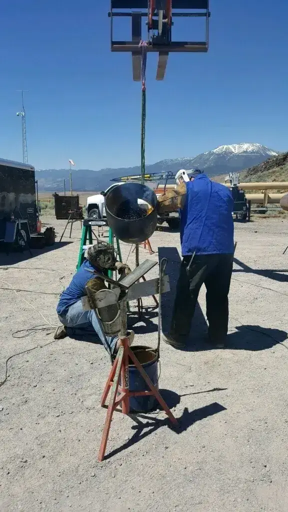 S&S Mechanical welder fabricating pipe on a job site